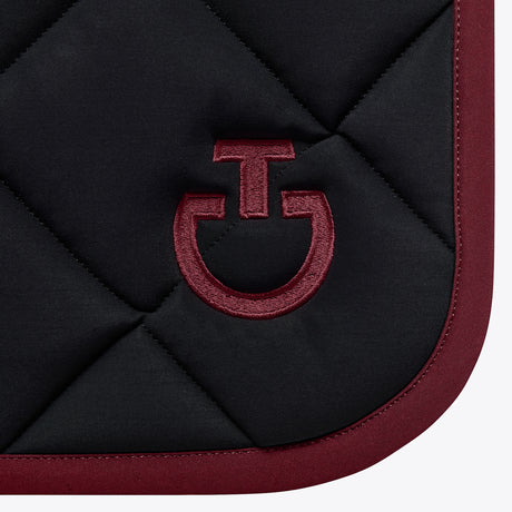 Set sottosella e cuffia Jumping Cavalleria Toscana con trapuntatura a rombi blu con logo e bordo bordeaux